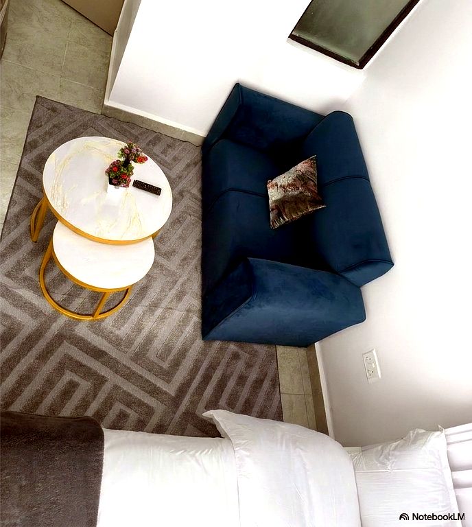 Top-down view of lounge seating and marble tables